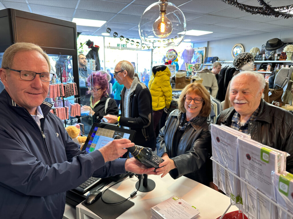 John Breckin helping out at the Rotherham Hospice Wickersley Shop